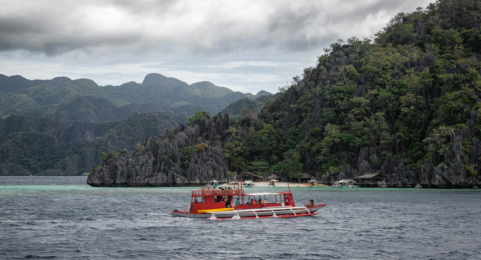 Small island hopping boat on the water in El Nido